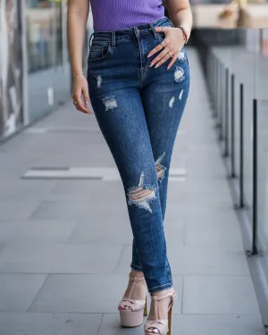 Jeans skinny con desgarres frontales